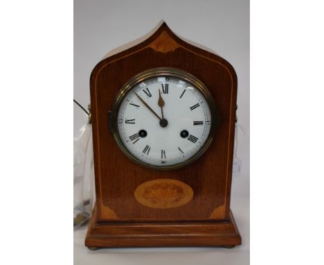 A late 19th century mahogany and satinwood inlaid bracket clock, ogee case, enamel Roman dial, (key and pendulum) (3)
