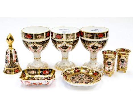 Three Royal Crown Derby Imari 1128, goblets, two trinket dishes, a pair of footed miniature vases and a bell (8 items, all 1s