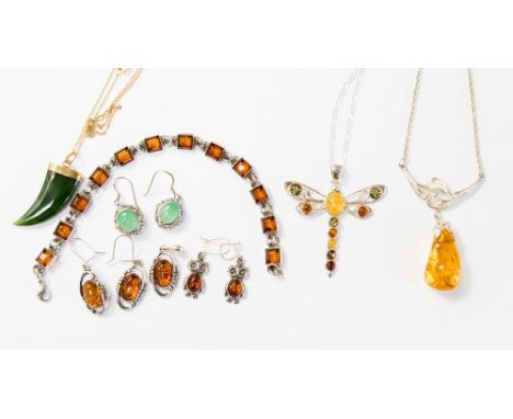 A collection of amber and jadite jewellery including a silver and amber drop necklace, a silver and multicoloured amber Butte