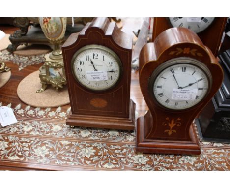 A fruitwood mantle clock, inlaid with satinwood on brass bun feet, Roman numerals with a Perrett and Joyner mantle clock (dam