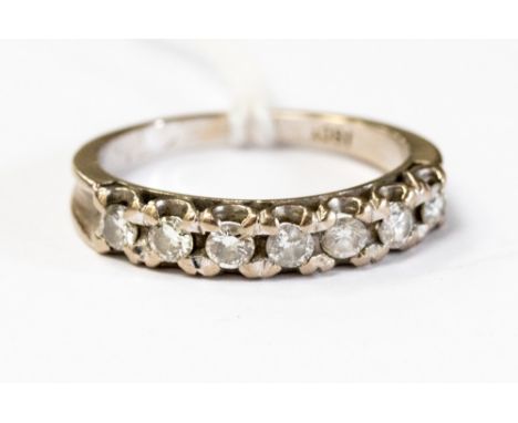 A diamond, seven stone 18ct white gold half eternity ring, with claw settings,  total diamond weight approx 0.50ct, ring size