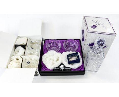 An Edinburgh crystal Continental collection glass decanter, an Edinburgh International crystal set of six tumblers, plus an E