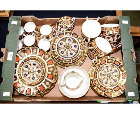 One box of Royal Crown Derby part tea service: twelve cups, twelve saucers, slops bowl, milk jug, twelve side plates and two 