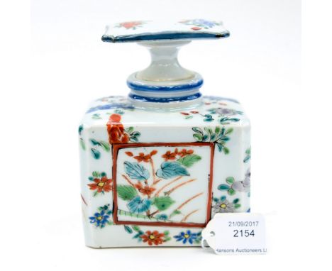 A Japanese ceramic tea caddy with stopper, hand painted with birds of paradise, some crazing to the glaze