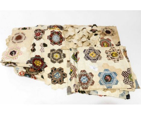 A collection of 18th and 19th century printed cotton fabrics cut and sewn into a patchwork quilt (not completed). Large quant