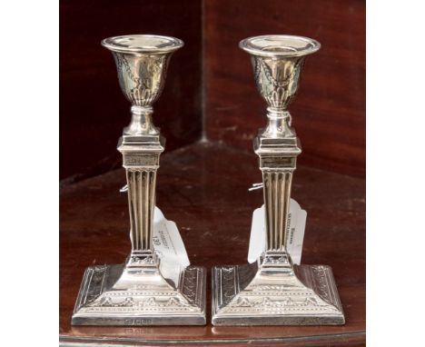 A pair of hallmarked silver candlesticks Sheffield 1896, Harrison Brothers & Howson (George Howson) (2) 