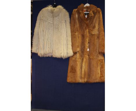 A blue Fox fur coat, Saga Fox, made from Norway Blue Fox, plus a Coney tan brown fur three quarter length coat, made by Femin
