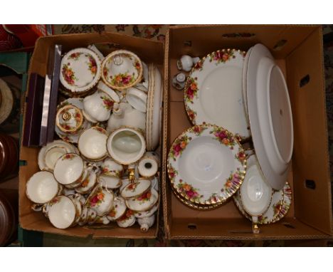 Two boxes containing a large quantity of Royal Albert Old Country Roses china including dinner service, tea service and coffe