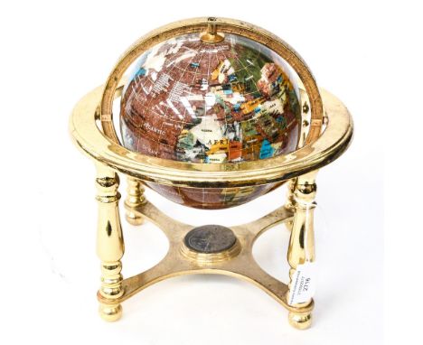 A decorative globe inlaid with semi precious stones, flat cut 