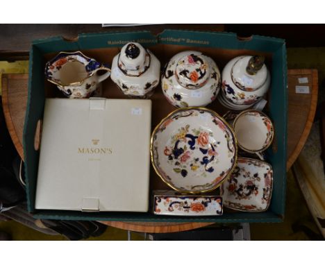 Fourteen items of Masons Ironstone in the Mandalay pattern including lamp, jug, clock, ginger jar, bowl and plates, etc (14) 