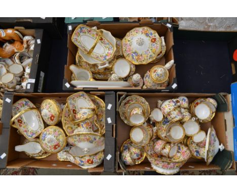 A large and comprehensive Hammersley hand painted dinner, tea and breakfast service, to include breakfast cups, tea cups and 