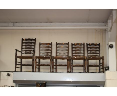 A set of eight solid beech rush seated ladder back chairs, comprising a pair of armchairs and six side chairs, together with 