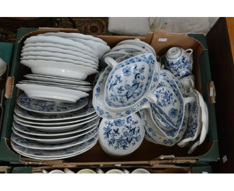 A Meissen part dinner service decorated in the 'Onion' pattern, having Oriental style floral and foliate pattern, including d