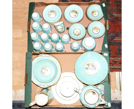 An early 19th century hand painted part tea set, comprising 12 cups, 10 saucers, 12 side plates, bowl, teapot, comports, coff