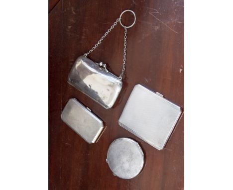 Two silver pocket cigarette cases, a silver silver finger purse Birmingham 1909 and a silver powder compact (4)