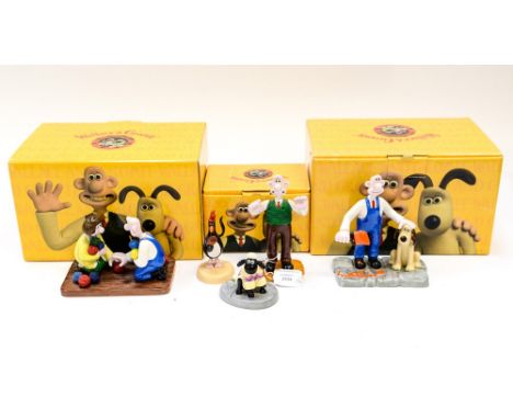 Three boxed Coalport Wallace and Gromit characters figures and figure groups. comprising of core range 'Shauns New Coat' 'Woo