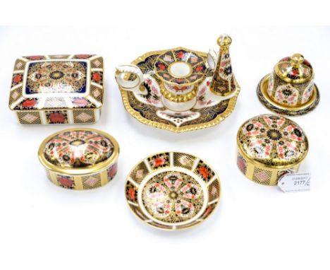 A collection of Royal Crown Derby Old Imari 1128 pattern wares, including three trinket boxes, chamber stick, pin dish and an