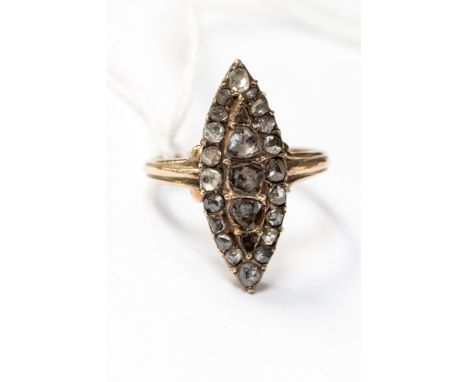 An early Victorian yellow metal and diamond cluster ring, the ring is marquise in shape and claw set with rose cut diamonds, 