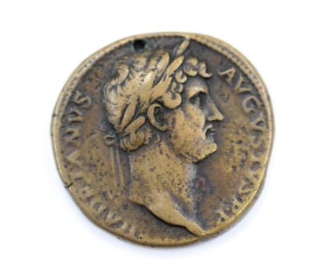 Hadrian Sestertius, Rome, 128-132 AD.Obv. HADRIANVS AVGVSTVS PP, laureate head right.Rev. COS III, SC in exergue, Roma seated