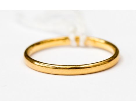 A 22ct gold wedding band, size M, weight approx 2gms