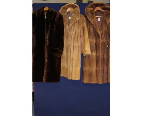 A circa 1930s Musquash coat with a later Musquash coat and a Beaver Lamb coat (3) 
