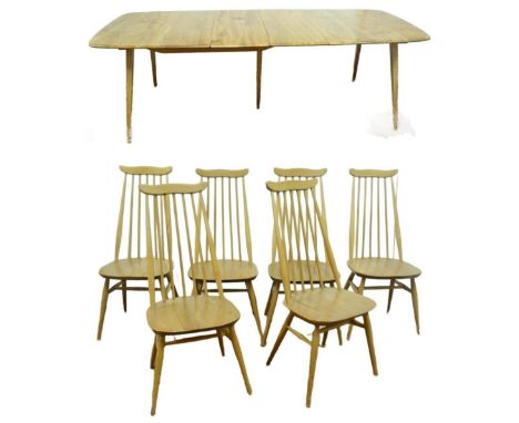 Ercol blonde ash and elm extending dining table with two additional leaves, 71cm high, 150cm long, 222cm long fully extended 