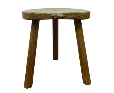 Robert 'Mouseman' Thompson of Kilburn Oak shaped top stool with typical carved mouse signature, on tripod supports, 36cm high