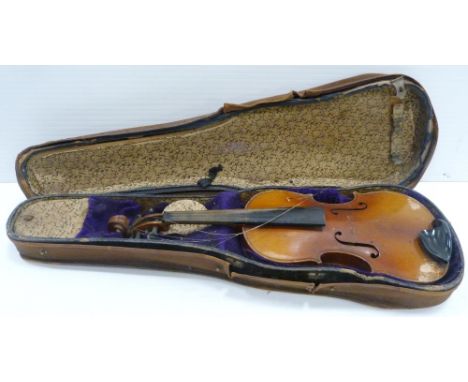 European-made violin after Stradivarius, bearing a Stradivarius label, in an early 20th century case.