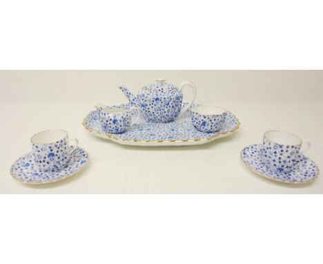 Copeland Spode 'Blue Chintz' porcelain cabaret set comprising a teapot, sugar and cream, two cups and saucers, with tray, the