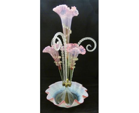 Victorian vaseline and tinted glass flower epergne with four cranberry-tinted glass trumpets flanked by three candy twist can