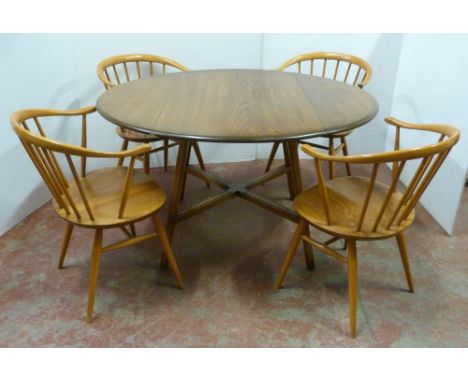 Set of four mid-century Ercol elm and beech 'Cowhorn' chairs with stick backs, stamped to the underside '1960 - 2056', 78cm h