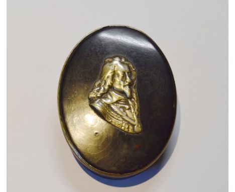 Antique horn and nickel overlaid snuff box bearing a bust of John Obrisset to the cover, 2.5cm high and 10cm wide.CONDITION R