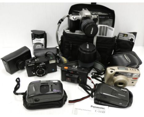 Group of cameras to include a Nikon F65 with lens, Cosina VAF, and others by Samsung, Kodak and Canon etc., with some accesso