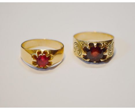 Gold garnet ring, size W, 7g gross, and another 14k gold ruby ring, size X, 5.8g gross.&nbsp; (2)