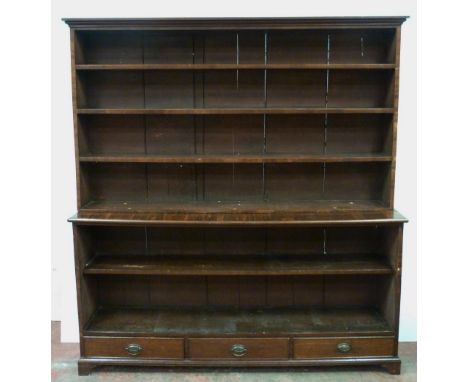 19th century mahogany bookcase, the narrow top section with fixed open shelving above a single shelf to the lower section abo