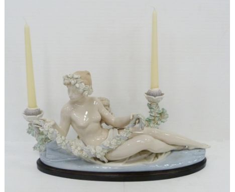 Lladro candelabra modelled as a classical reclining nude female with crouching child behind, holding and wearing a floral wre