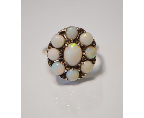 Opal and marcasite oval cluster ring in silver, size L.