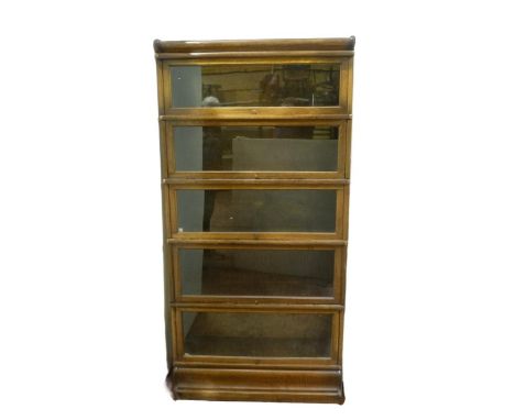 Globe Wernicke oak five-section stacking bookcase, each section with a glazed door, 177cm high, 87cm wide and 27cm deep.