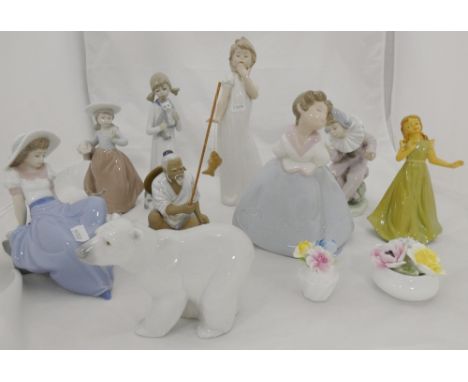 Group of Spanish figures of children, mainly by Nao, also a Lladro figure of a polar bear, another figurine, Chinese-style gl