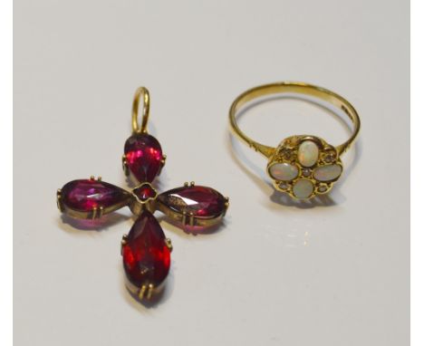 Opal and diamond ring in 9ct gold, 1.7g gross, and a garnet cruciform pendant. (2)