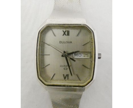 Bulova quartz gent's wristwatch, c. 1970s, with tank-style case, plated bezel, silvered dial, baton indices and date window, 