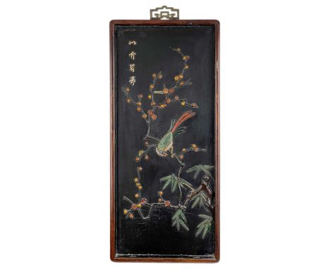 A Chinese lacquered wood panel, early 20th century. With hardstone bird and blossom decoration, including agate and jade, bon