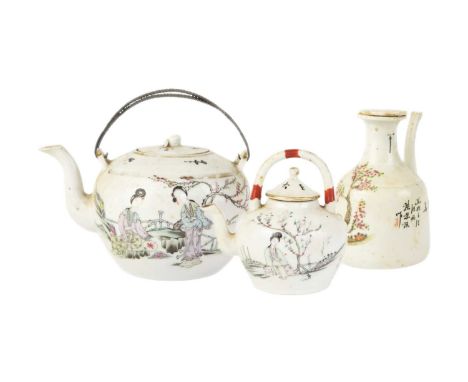 A Chinese porcelain teapot, early 20th century. With two female figures in a garden setting, opposed by calligarphy, red seal
