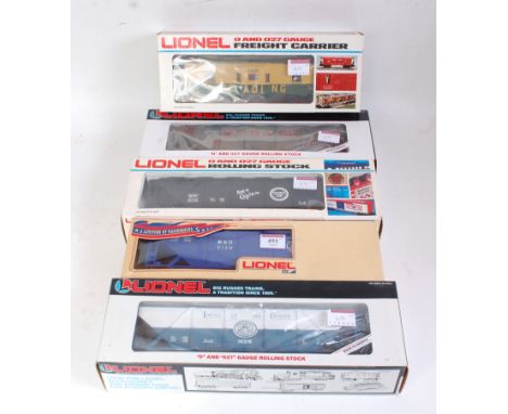 Five Lionel goods wagons: B&amp;Ohopper 9130, Reading Bay window caboose 6-6439; Missouri Pacific covered hopper 6-6110; Waba
