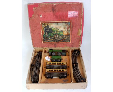 Mettoy boxed set comprising green LNER electric loco No. 490, 4-wheel LNER tender, two brown and cream bogie coaches, track (