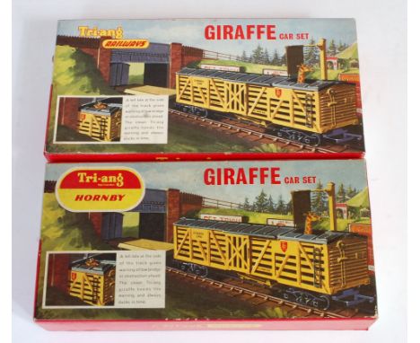 A Triang R348 Giraffe car set appears complete and with instructions (M-BM) and a similar Triang Hornby item (NM-BM), missing