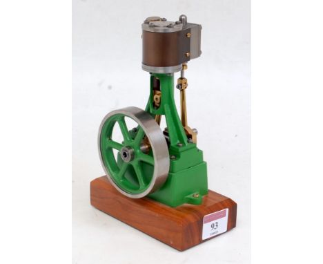 A Stuart Turner horizontal live steam engine No. 10V of usual specification comprising of hand painted green body with a sing