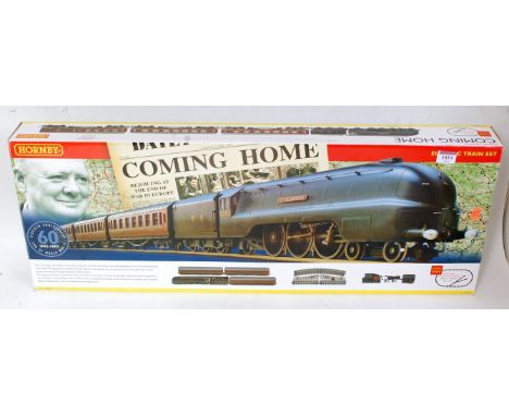 A Hornby R1060 "Coming Home" train set containing LMS black streamlined City of Lancaster engine and tender, 3 x Stanier coac