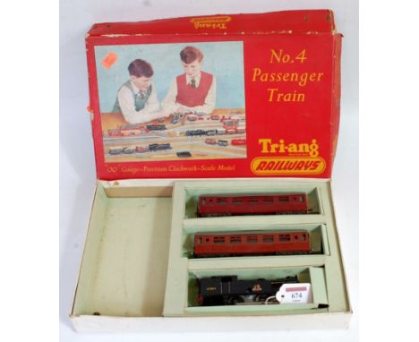 A Triang Railways No. 4 passenger train set containing clockwork ex Trackmaster 0-6-2 tank engine, BR gloss black and 2 short