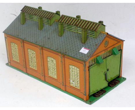 A Hornby 1935-41 E2E engine shed complete, minor fold to one door but good for age (G)